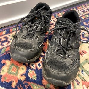 Size 4 Merrell kids outdoor shoe/ hiking boot, perfect for winter weather.